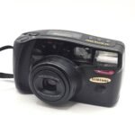 AF Zoom 1050, lente 38-105mm Super Macro