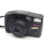 AF Zoom 1050, lente 38-105mm Super Macro